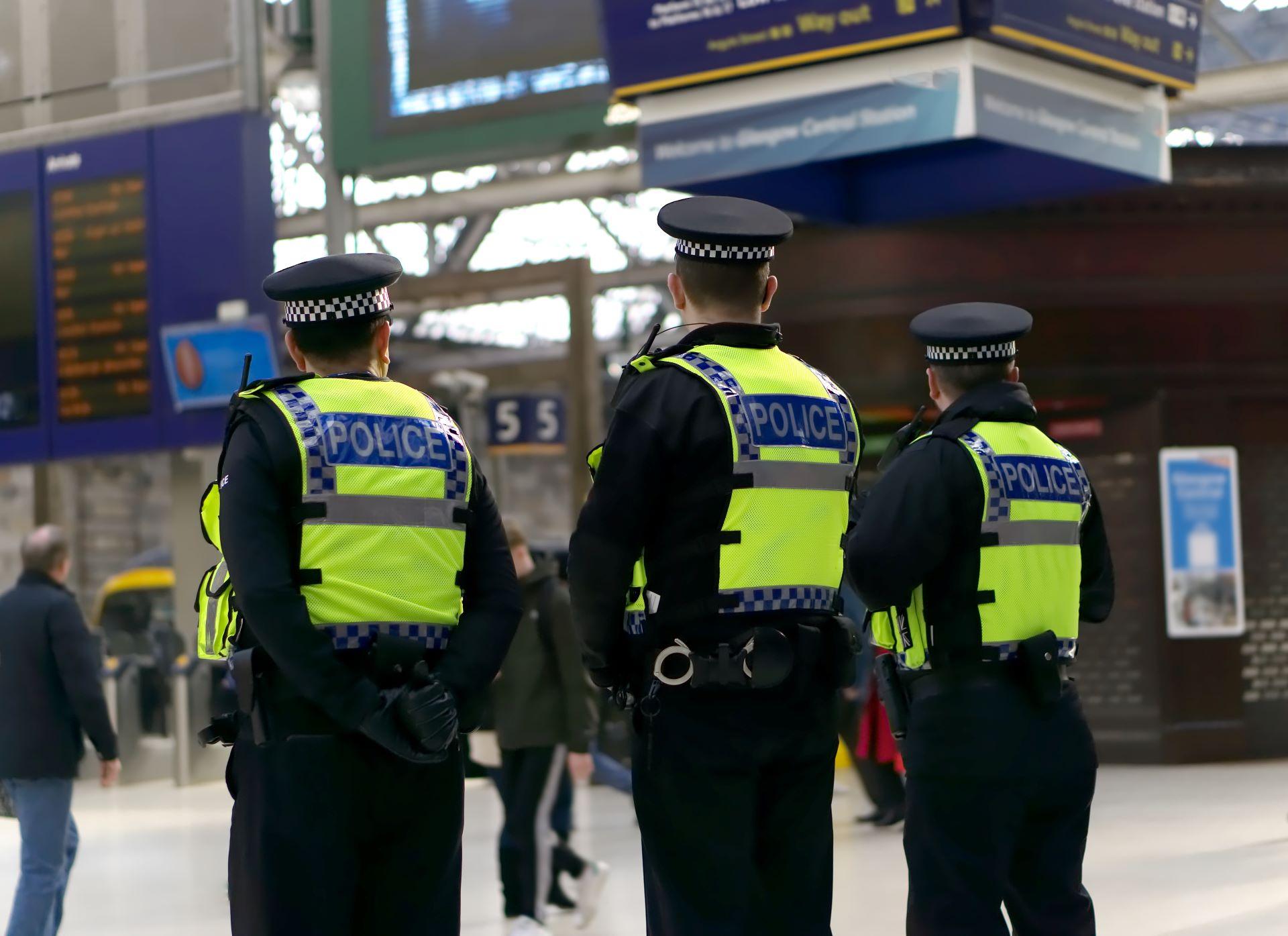 Policemen in England guarding a scene